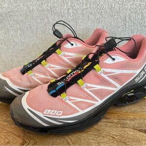 Salomon Pink and Black Athletic Shoes with Streamlined Design